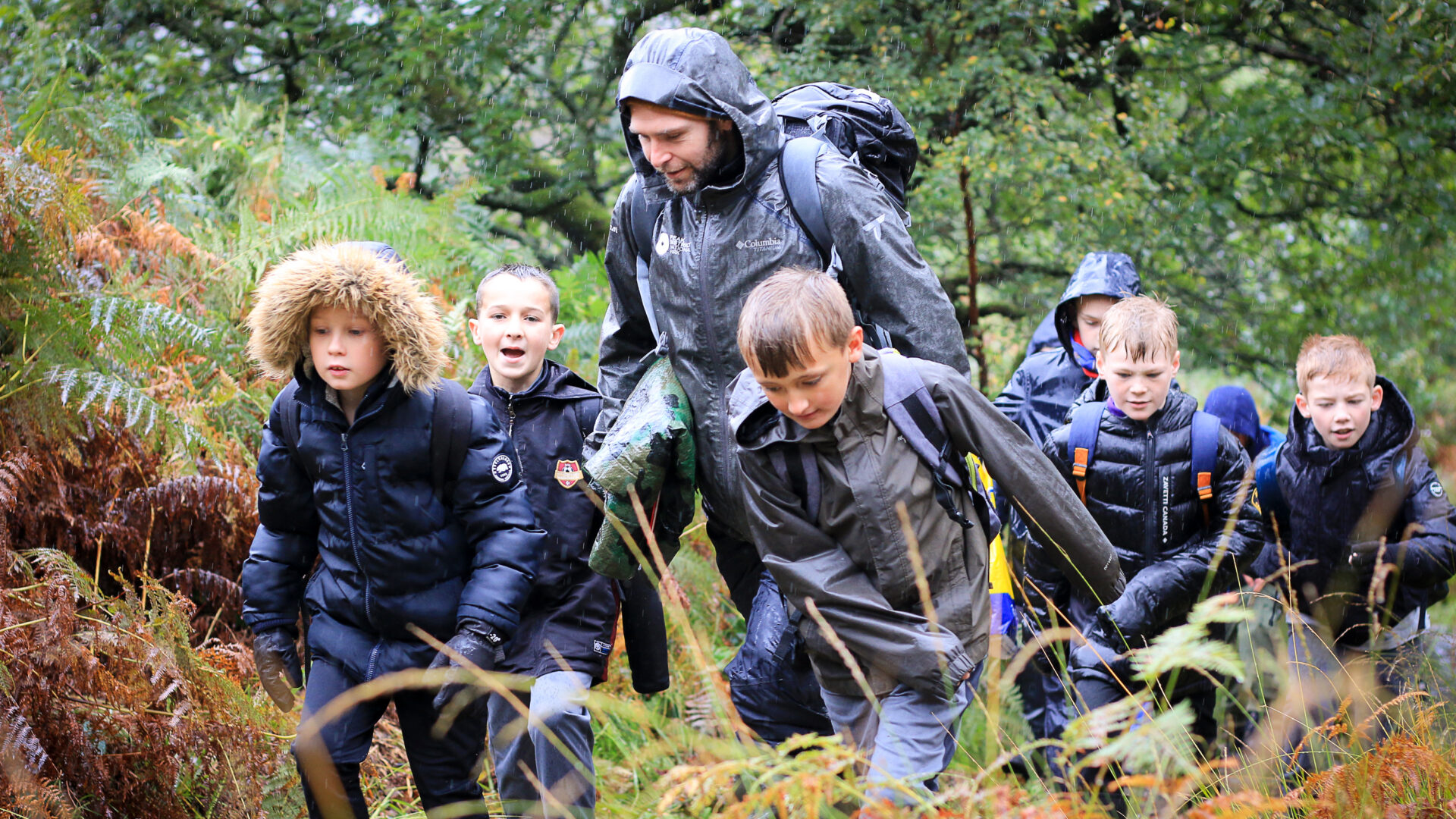 Pupils from Gamesley Community Primary School and Haveley Hey Primary School enjoy a soggy day in the Peak District National Park as part of Generation Green 2. Photo: Tom Marshall