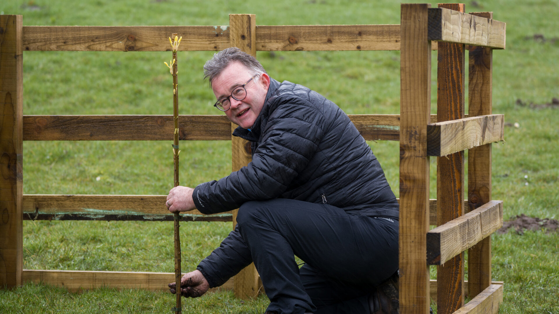 Northumberland National Park CEO Tony Gates plants the first National Park sapling at Walltown Crags. Photo: Alasdair McKenzie